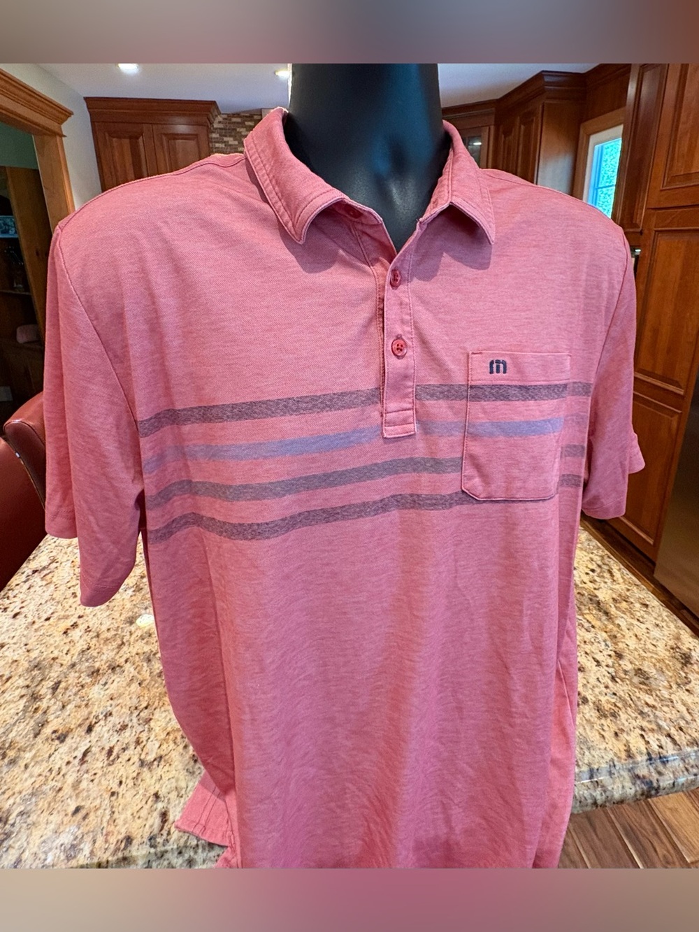 Travis Mathew Men's Heathered Pink Polo w/Stripes. Logos on front/back/sleeve